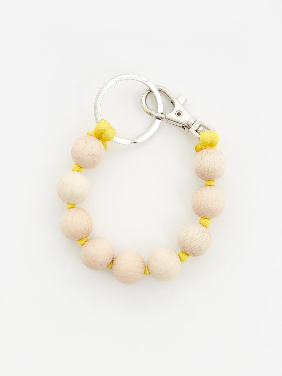 Ina Seifart Ina Seifart Dicke Perlen Short Key Holder - Natural/Yellow - Yellow